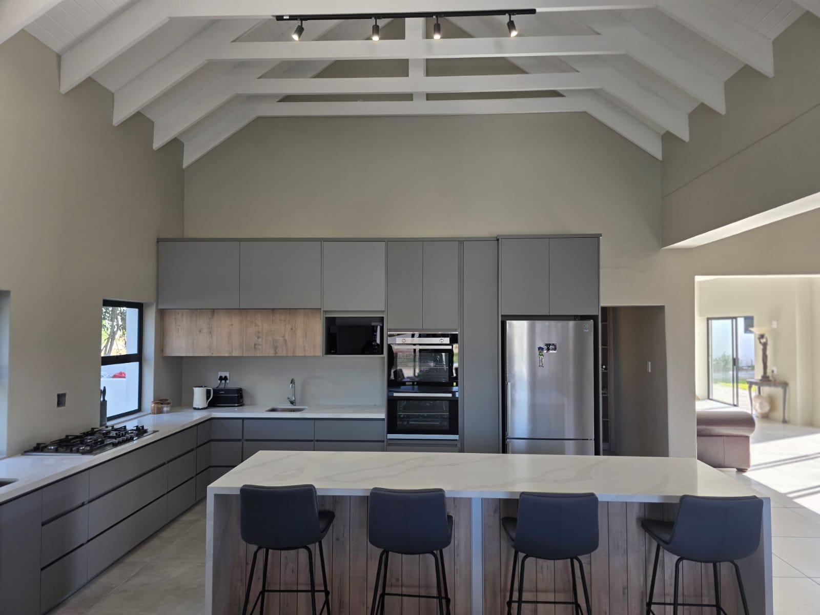 Built-in rustic wood grain cupboards in a Langebaan kitchen