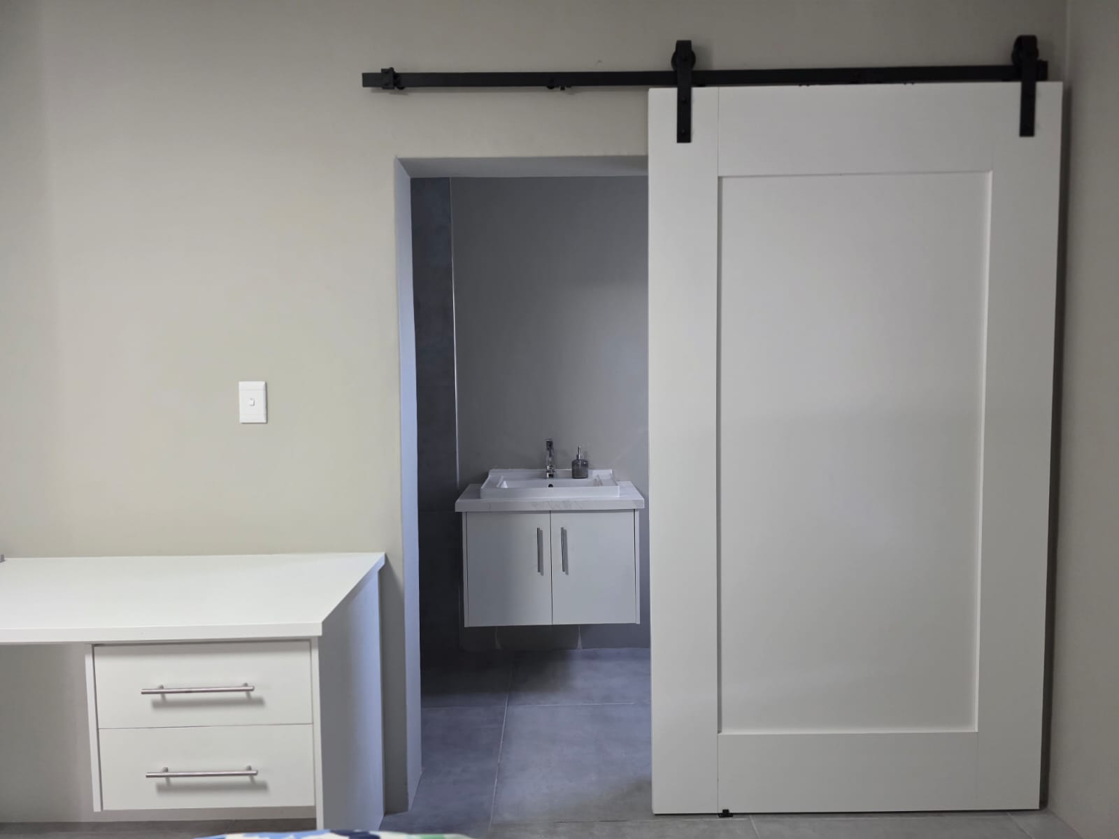 Custom bathroom vanity with mirror and basin installation